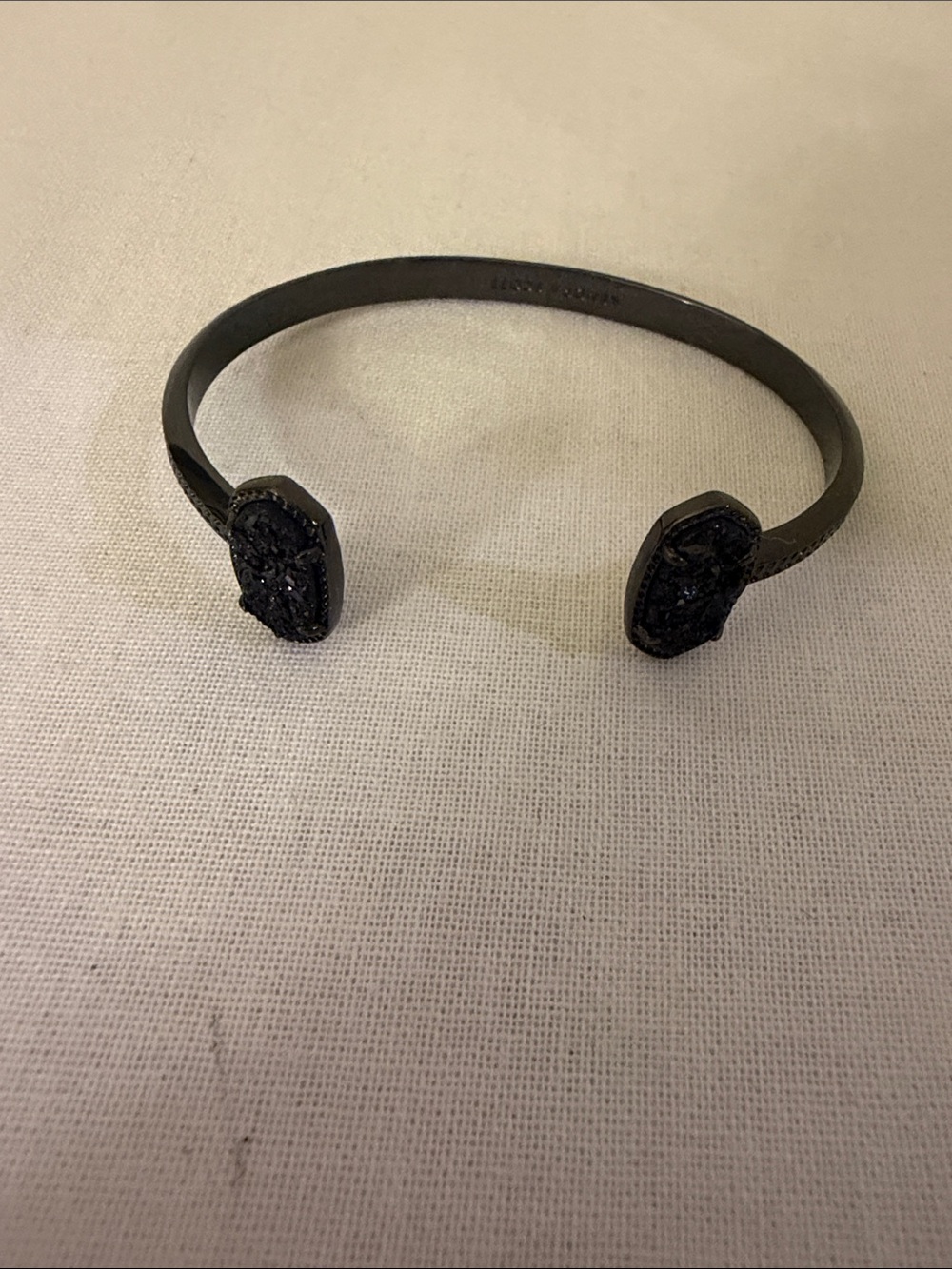 Kendra Scott black open cuff bracelet with druzy ends